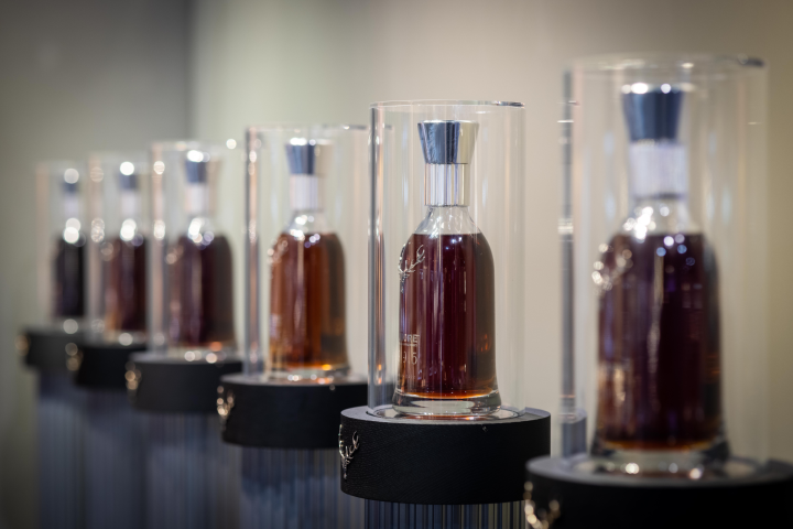 The Dalmore Decades whisky bottles in a row